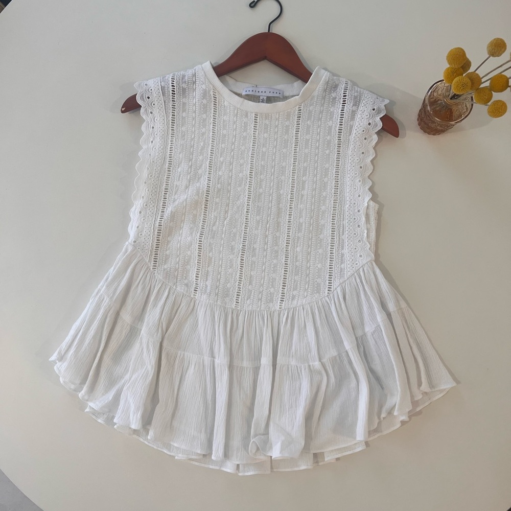 Lace peplum top with ruffle on the bottom